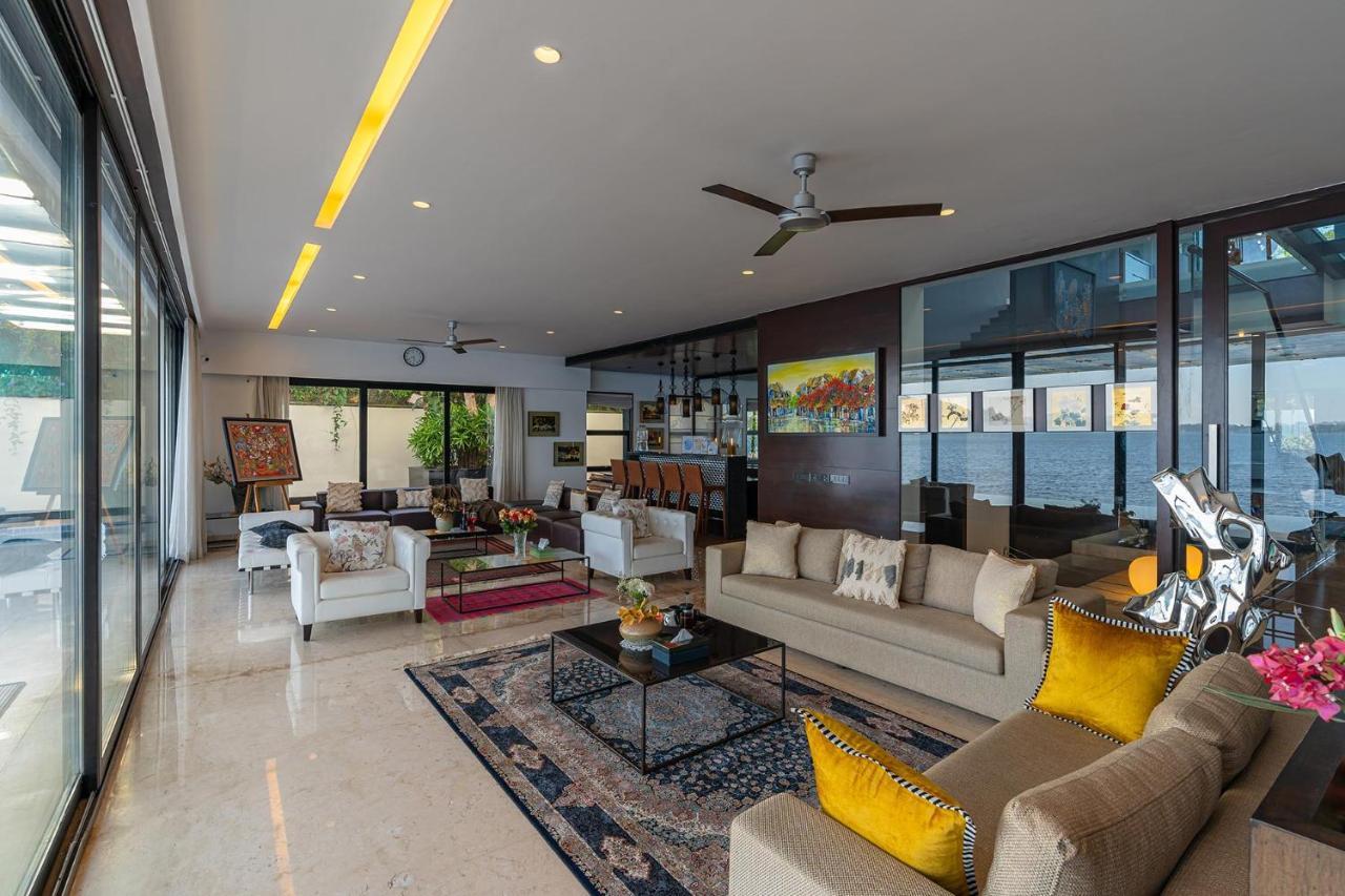 Oceanic Sunsets With River View, Comp Breakfast & Infinity Pool At Stayvista Verem Esterno foto